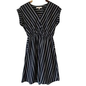 Striped Navy and White Dress with capped sleeves and pockets. Coastal travel